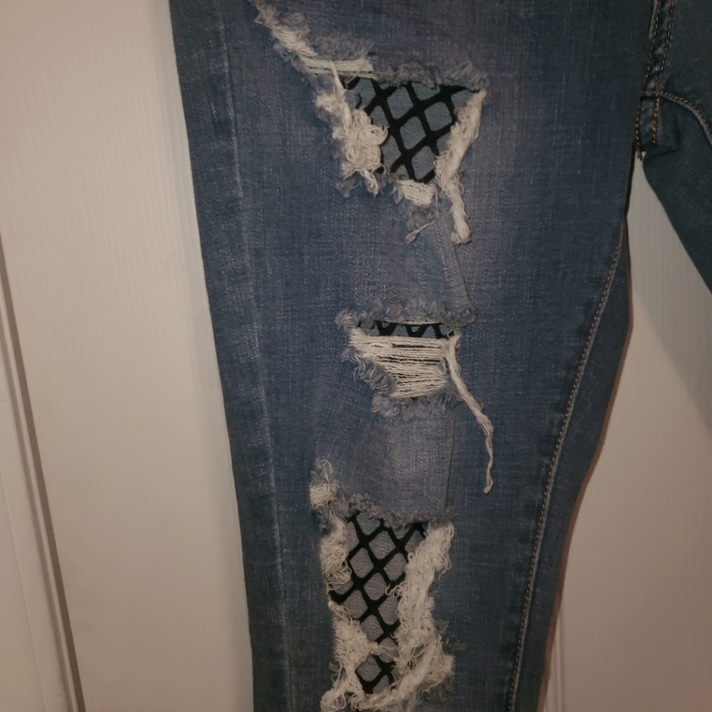 Fishnet distressed jeans